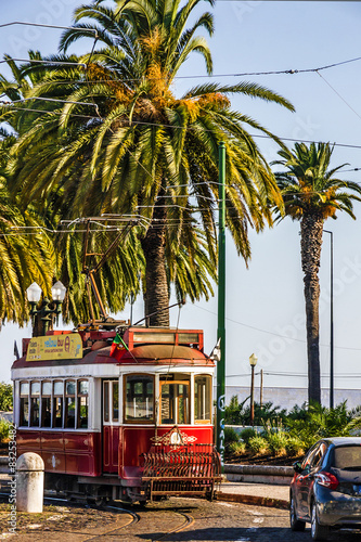 Historic red tram in Lisbon, Portugal.