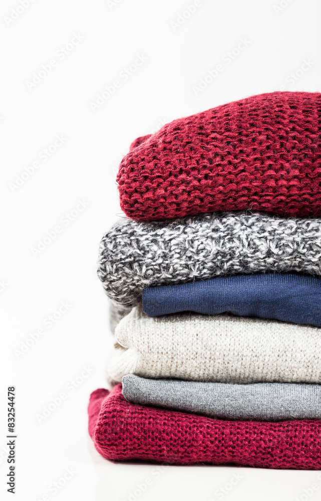 Stack of handmade wool sweaters