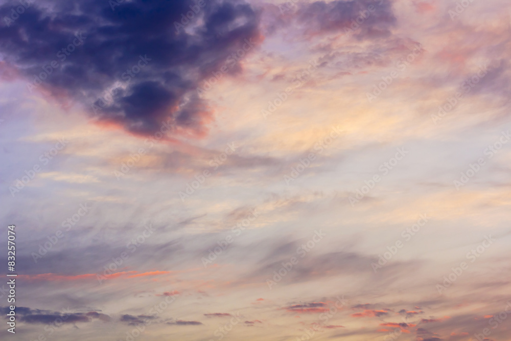  	  Scenic sky with clouds of different shapes at sunset.