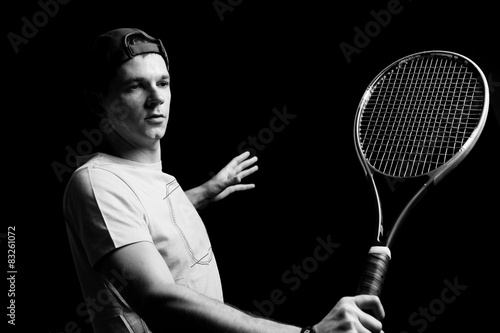 Tennis player on black background. Studio shot © fotofabrika