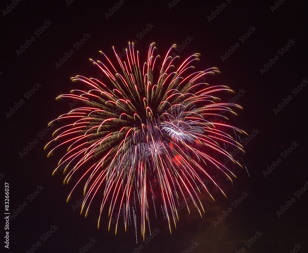 Evening fireworks in sky in honor of celebration of Victory Day