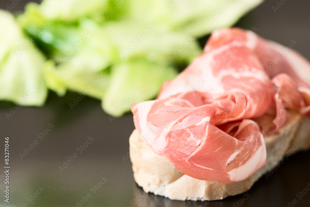 Ham Sandwich horizontal on black plate