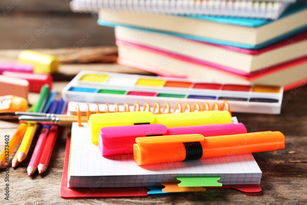 Fototapeta premium Bright school stationery on old wooden table