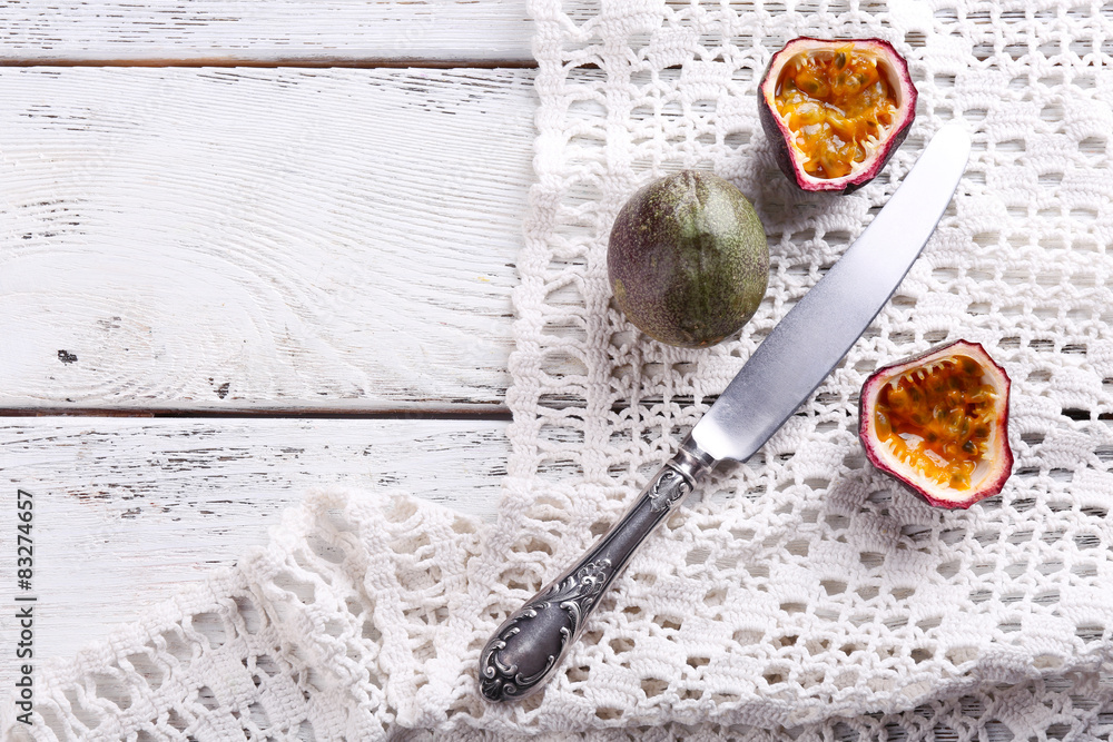Passion fruits on color wooden background Passion fruits on color wooden background