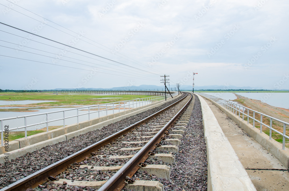 Railroad tracks into the reservoir, Lopburi Thailand. 