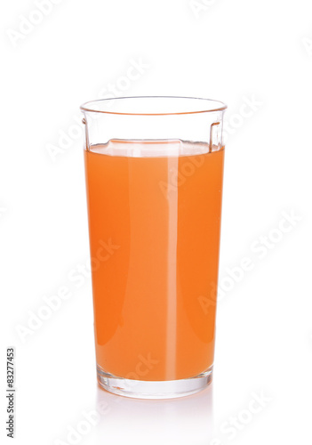 Glass of carrot juice isolated on white