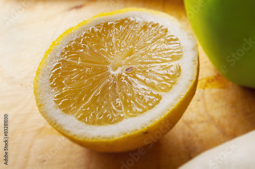 cut a lemon on old board