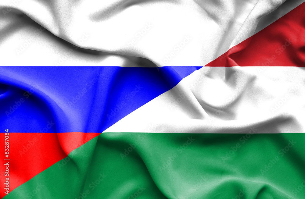 Waving flag of Hungary and Russia Waving flag of Hungary and Russia