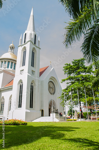 gothic style clock tower, Assumption University, Thailand photo