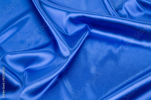 Blue silk cloth texture close up.