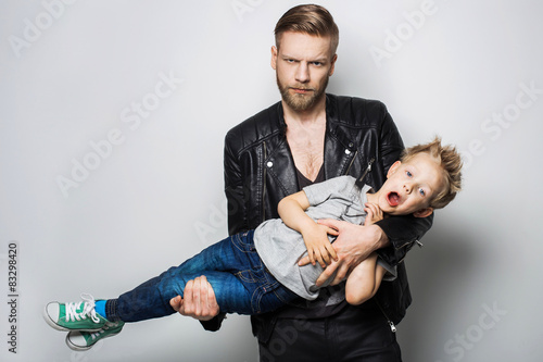 The portrait of a little boy and his father. Fathers day 