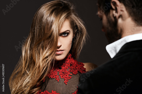 Fashion photo of sexy elegant couple in the tender passion