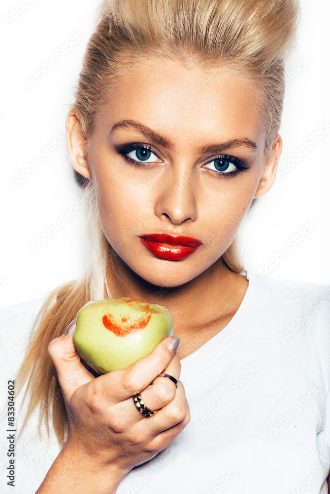 beautiful young woman holding an apple beautiful young woman holding an apple