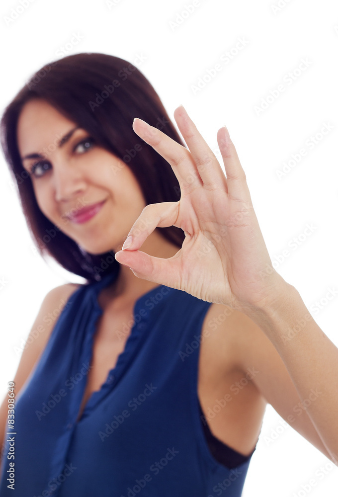 Young woman showing hand ok sign Young woman showing hand ok sign