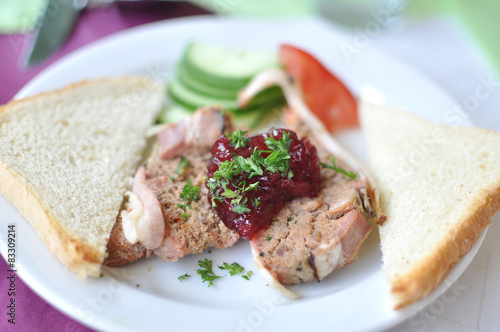 pate with toasts on white plate