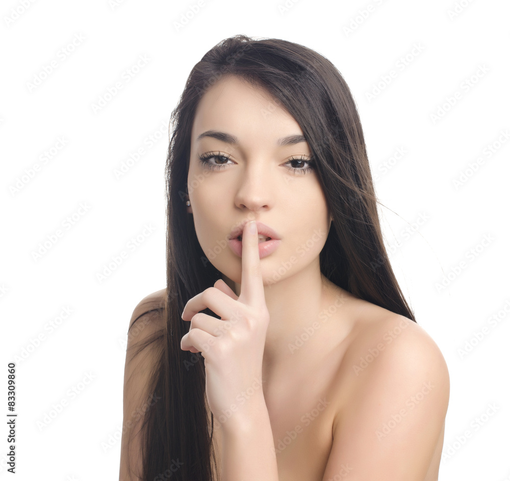 Beautiful brunette girl gesturing silence. Girl with secrets. Beautiful brunette girl gesturing silence. Girl with secrets.