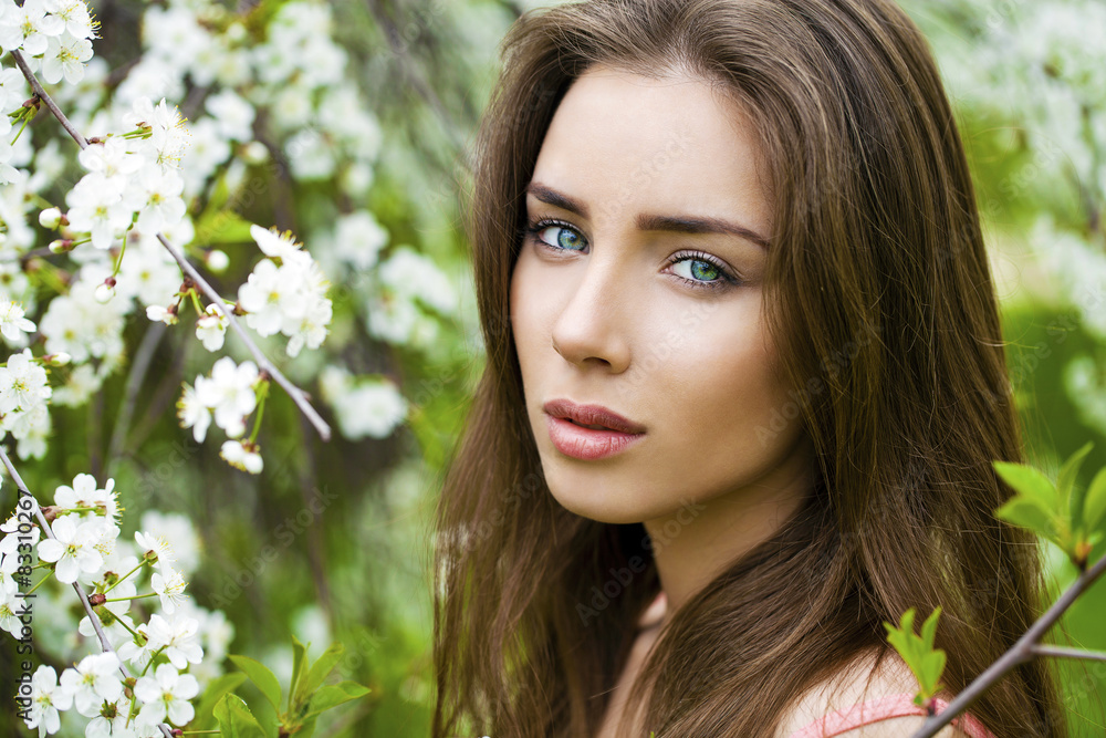 Close up portrait of a beautiful young girl on the background of Close up portrait of a beautiful young girl on the background of