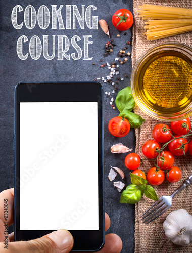 Cooking course sign and blank screen on cell phone