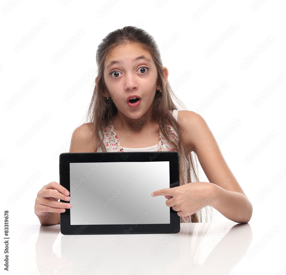 Beautiful pre-teen girl showing a tablet computer. Beautiful pre-teen girl showing a tablet computer.
