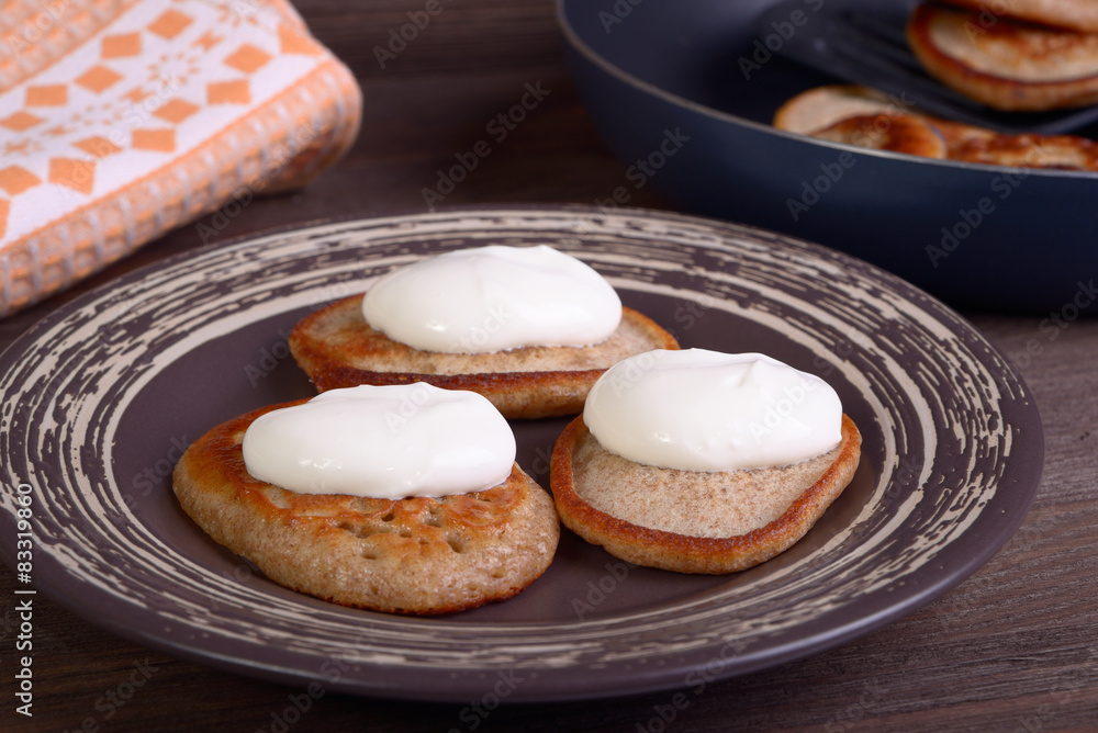 Fritters with sour cream