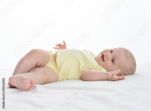  baby lying down isolated on white