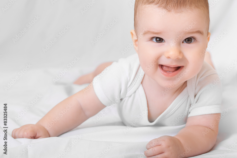 Cute smiling baby boy on white background Cute smiling baby boy on white background