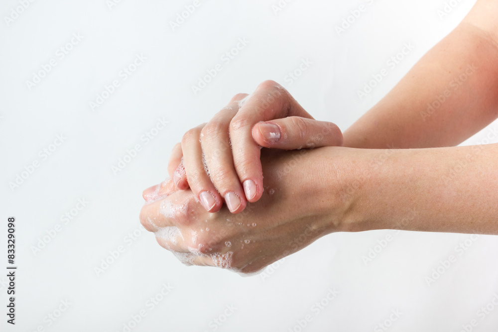 Fototapeta premium gesture of woman washing her hands on white background