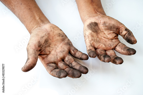 man with dirty hands