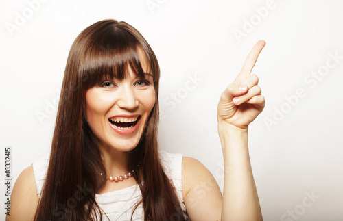 Wallpaper Mural young woman with her finger up  Torontodigital.ca