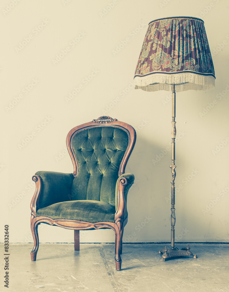 Fototapeta premium Vintage and antique chair with white wall background
