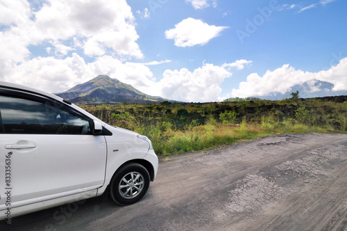 driving across the caldera ridge road among view of extinct crat © varandah