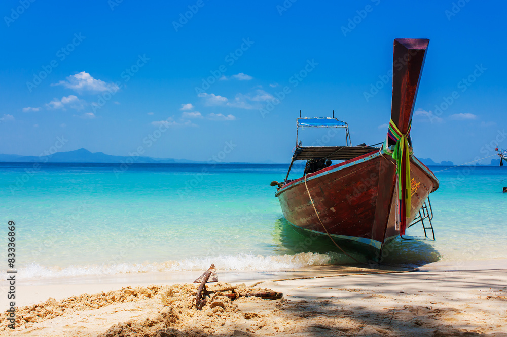 Boat on the beach and blue sky in Thaniland Boat on the beach and blue sky in Thaniland
