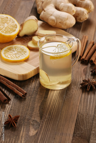 ginger tea in a cup of glass, ginger, lemon, cinnamon, star anis