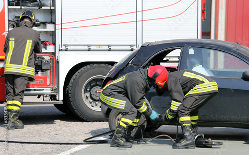 practice of firefighters in the Firehouse with simulation of roa