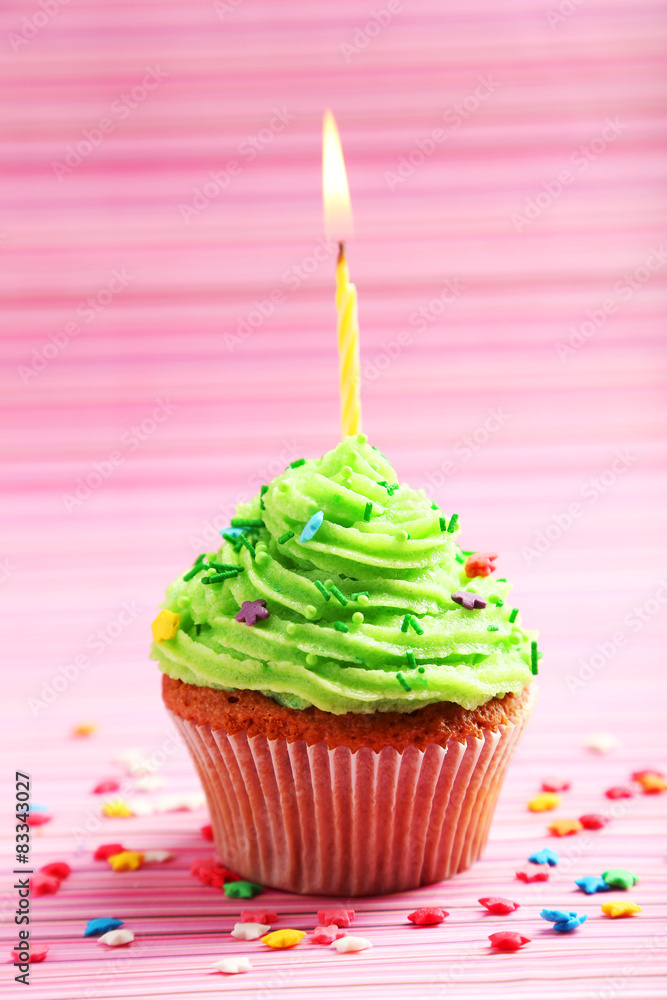 Birthday cupcake with butter cream and candle Birthday cupcake with butter cream and candle