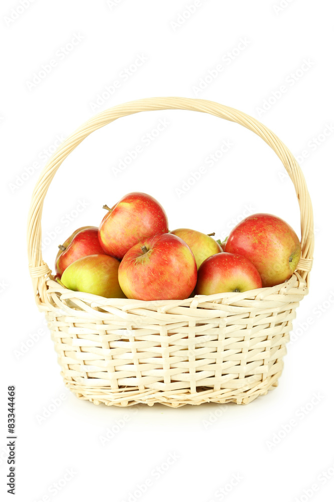 Beautiful apples in basket isolated on white Beautiful apples in basket isolated on white