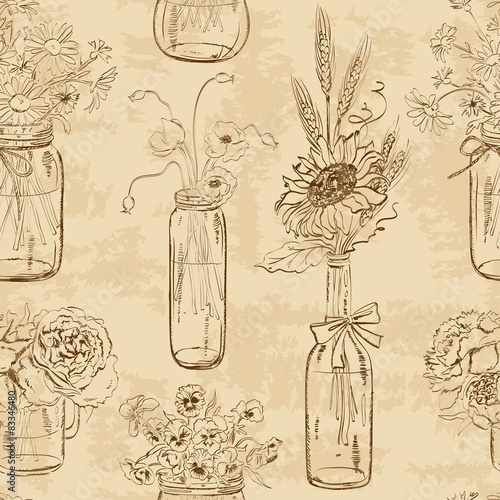 Seamless pattern of mason jars with flowers