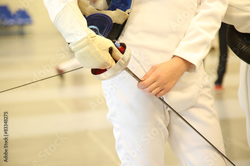 Photography fencer with fencing mask and rapier