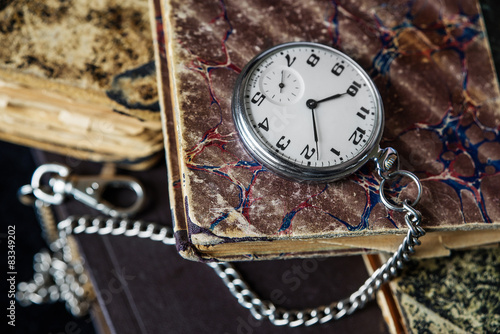 Old books and  pocket watch