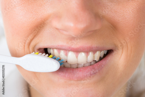 Woman Brushing Her Teeth