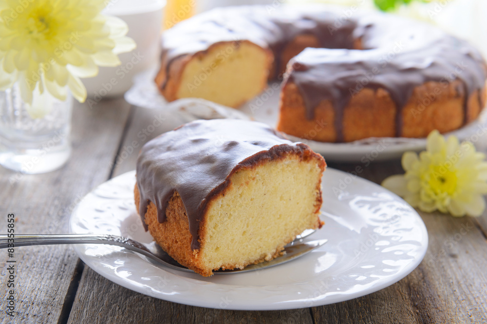 A slice of cake with chokolate icing A slice of cake with chokolate icing