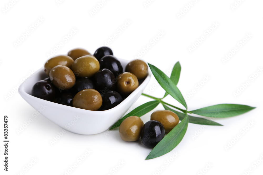 Green and black olives in bowl isolated on white Green and black olives in bowl isolated on white