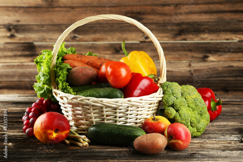 Fototapeta Naklejka Na Ścianę i Meble -  Vegetable in basket on brown wooden background