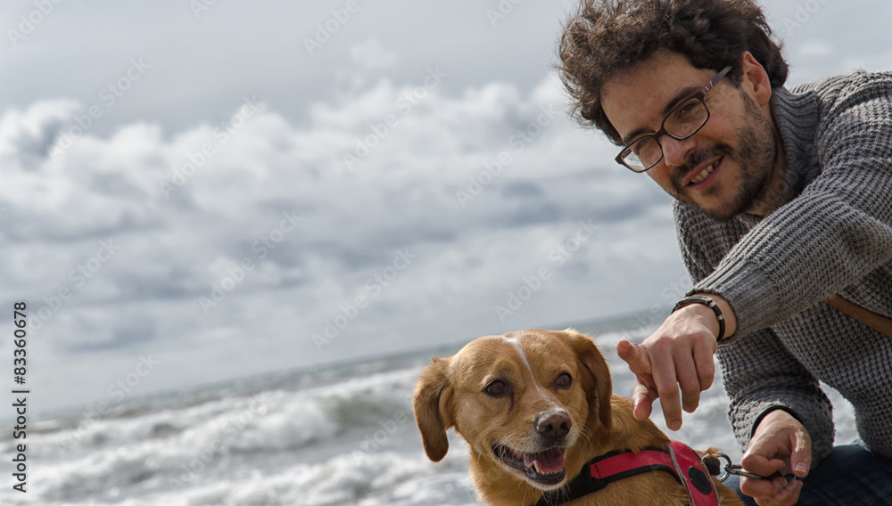 Man and dog on the beach