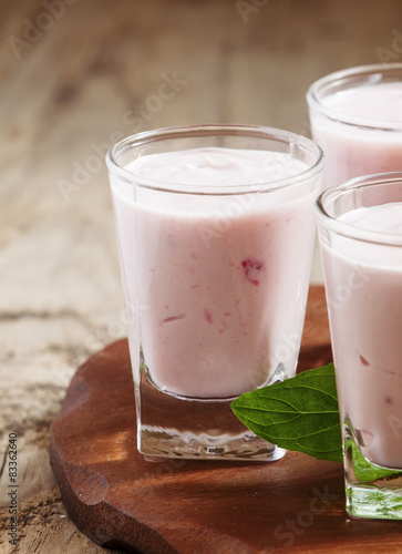 Fresh homemade yogurt berries in glasses, selective focus