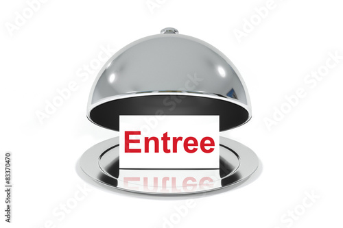opened silver cloche with white sign entree