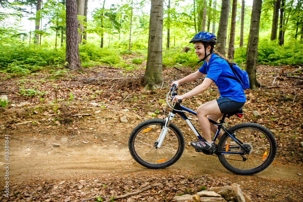 Healthy lifestyle - teenage girl cycling Healthy lifestyle - teenage girl cycling