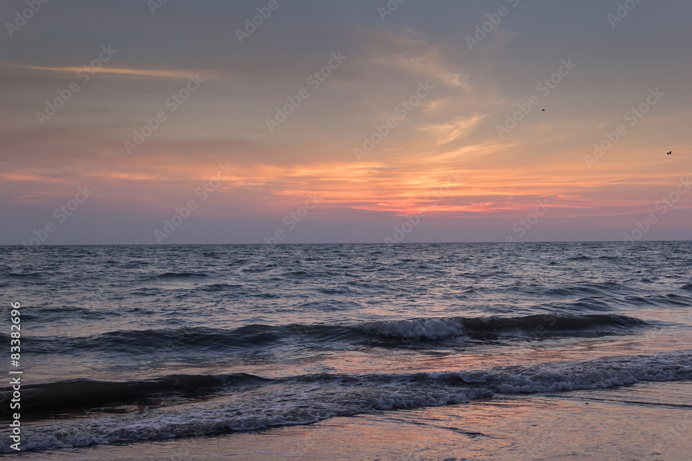 Obraz premium Playa al atardecer