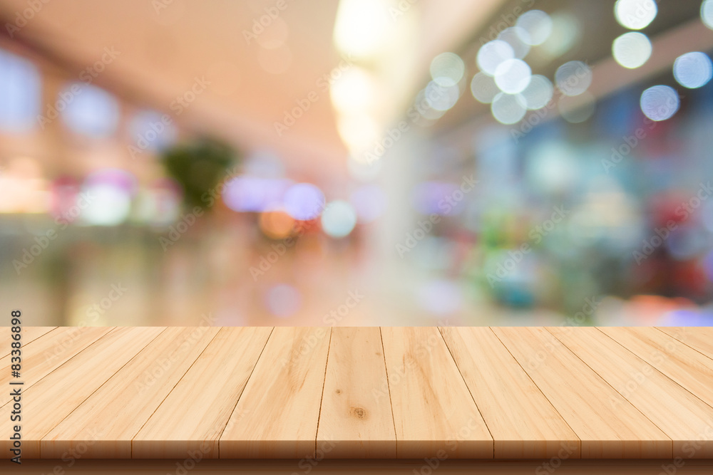 Shopping mall blur background and wooden floor
