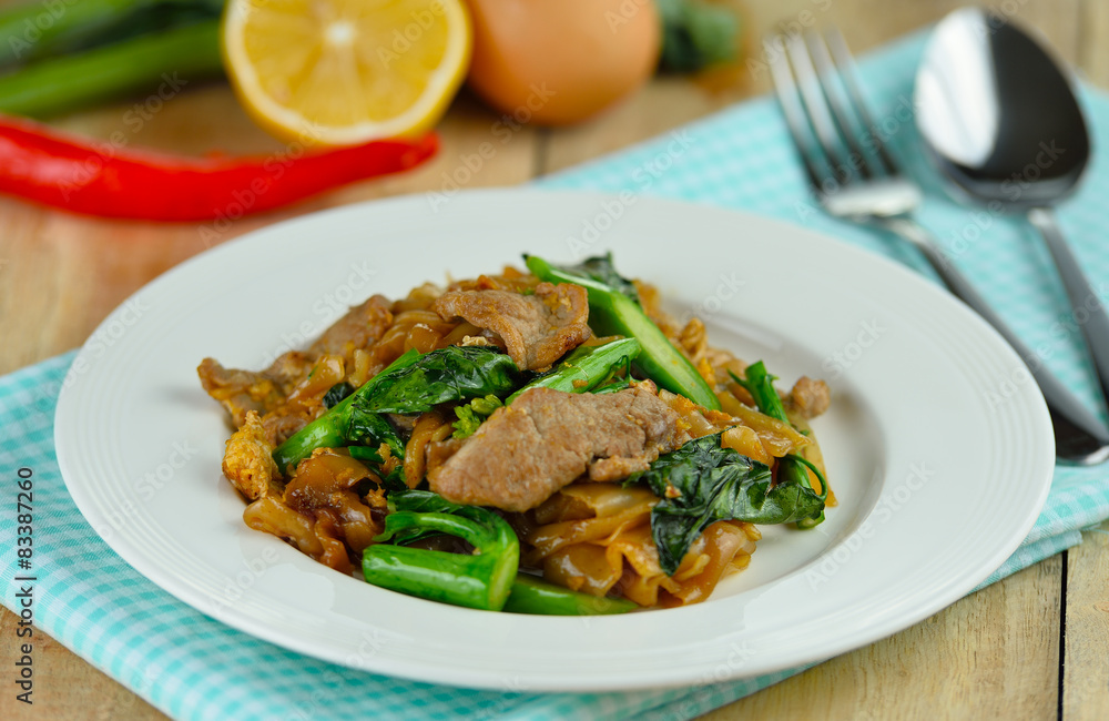 Stir-fried Noodles with pork and  chinese broccoli  in Sweet Soy